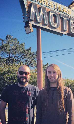 Tobias and Bruce infront of motel